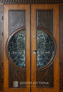 Парадная дверь с коваными элементами №101 - фото №1