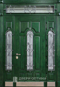 Большая входная дверь с ковкой для дома №11 - фото №1